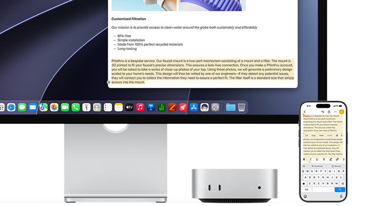 Apple Mac mini M6 with Studio Display and an iPhone while editing a document across devices.